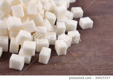 Heap of refined sugar 30425557