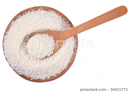 Shredded coconut in a wooden bowl Shredded coconut in a wooden bowl 30425771