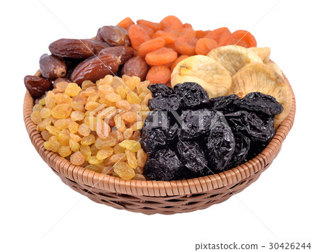Various dried fruits in wicker bowl 30426244