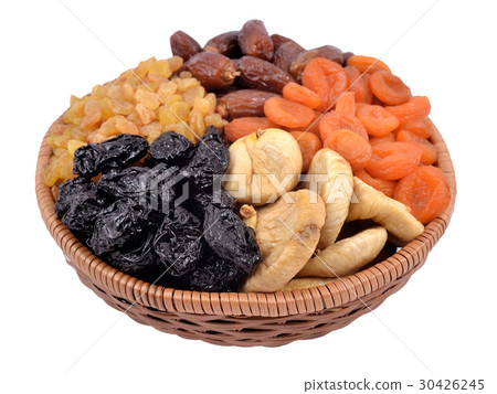 Various dried fruits in wicker bowl 30426245