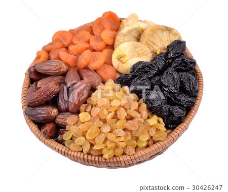 Various dried fruits in wicker bowl 30426247