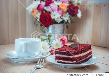 Red velvet cheese cake and dark chocolate on top 30428818