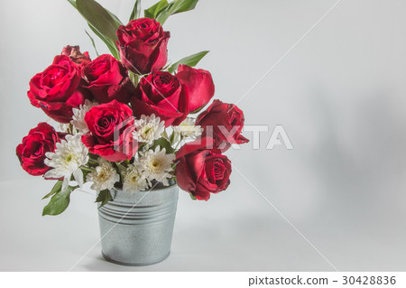 Vase of Roses bouquet on white background 30428836