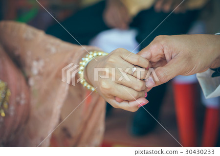 picture of man and woman with wedding ring picture of man and woman with wedding ring 30430233