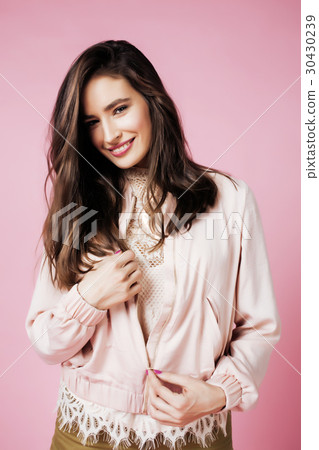 young cute disco girl on pink background smiling young cute disco girl on pink background smiling 30430239