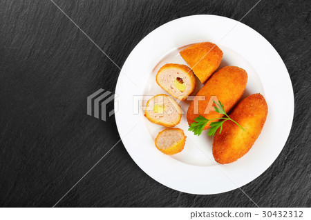 fried Chicken rissole on white plate 30432312