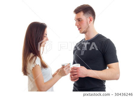 beautiful young guy with a girl look at each other beautiful young guy with a girl look at each other 30436246