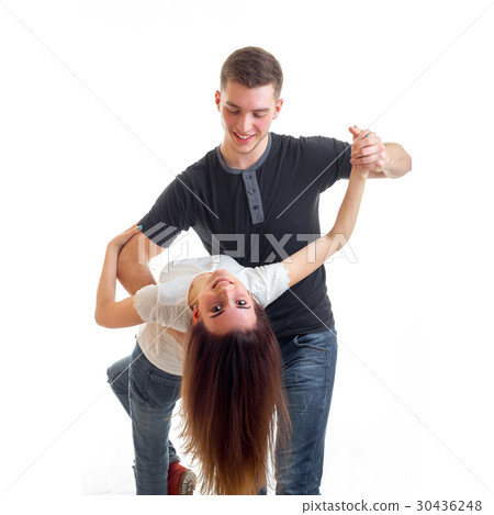 young handsome guy tilted the girl with long hair young handsome guy tilted the girl with long hair 30436248