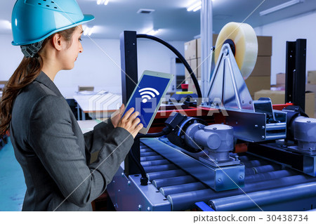 Factory worker with tablet 30438734