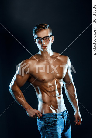 bodybuilder posing. Beautiful sporty guy male bodybuilder posing. Beautiful sporty guy male 30439336