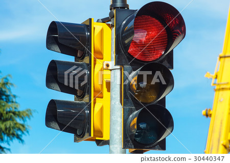 Red traffic light in the city street Red traffic light in the city street 30440347