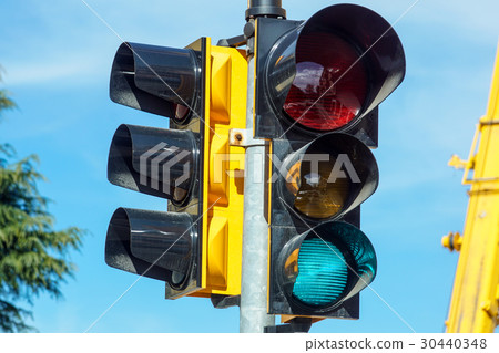 Traffic lights with the green light lit Traffic lights with the green light lit 30440348