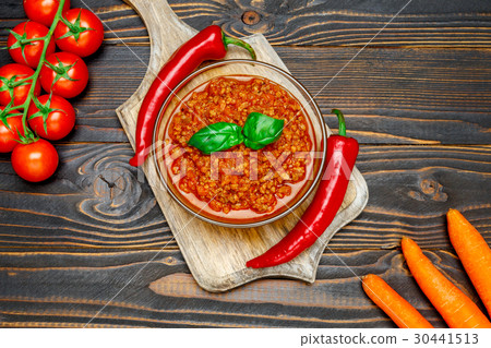 Spaghetti bolognese sauce in glass pot 30441513