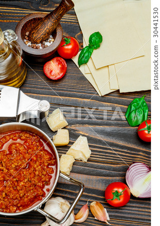 uncooked lasagna pasta sheets and bolognese sauce uncooked lasagna pasta sheets and bolognese sauce 30441530