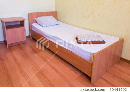 Sleeper - a bed and a bedside table in the Sleeper - a bed and a bedside table in the 30441592