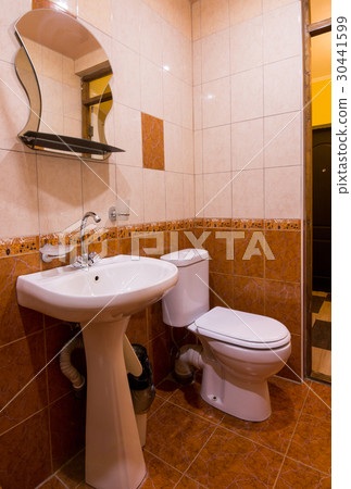 Bathroom in hotel, washbasin, mirror and toilet Bathroom in hotel, washbasin, mirror and toilet 30441599