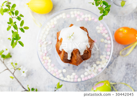Traditional Easter cake with colored eggs Top view Traditional Easter cake with colored eggs Top view 30442045