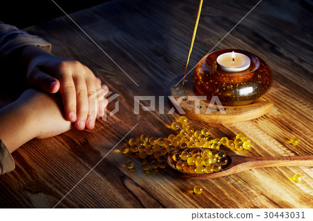 hands of the child, oil on a wooden spoon and 30443031
