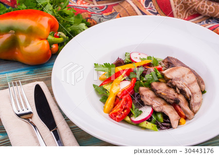 Mutton uvulas with salad and paprika 30443176