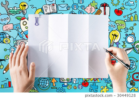 Hands ready to draw on a blank sheet of paper 30449128