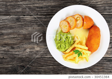 french fries, mashed pea and chicken rissoles french fries, mashed pea and chicken rissoles 30451364