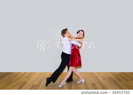The young boy and girl posing at dance studio 30455785