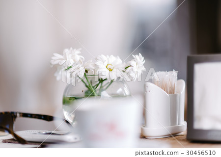 Vase with flowers in a cafe Vase with flowers in a cafe 30456510
