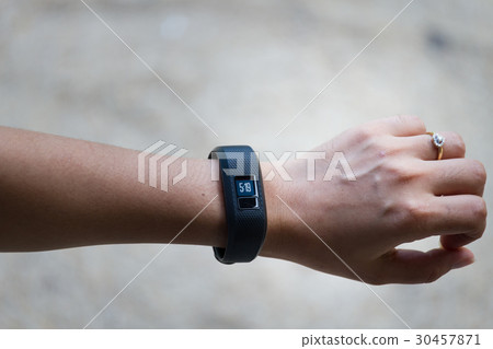 Young women wears smart watch 30457871