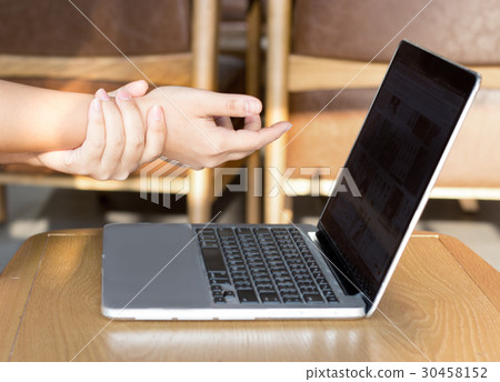hand massage wrist to heal pain 30458152
