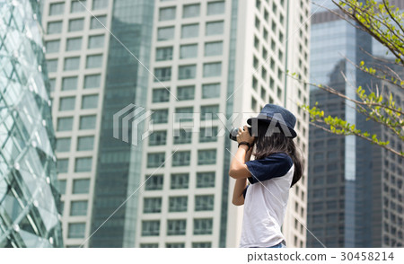asian girl take photo in city asian girl take photo in city 30458214