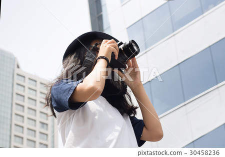 asian girl take photo in city asian girl take photo in city 30458236