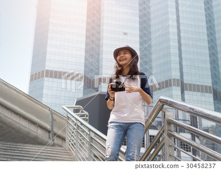 asian girl take photo in city asian girl take photo in city 30458237