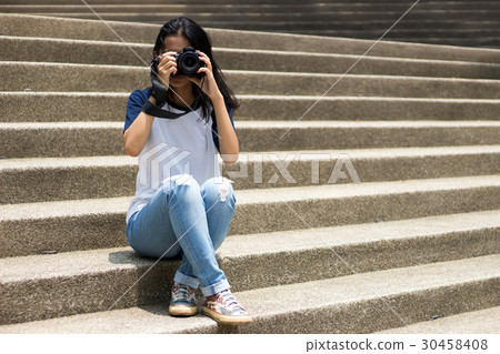 asian girl take photo in city asian girl take photo in city 30458408