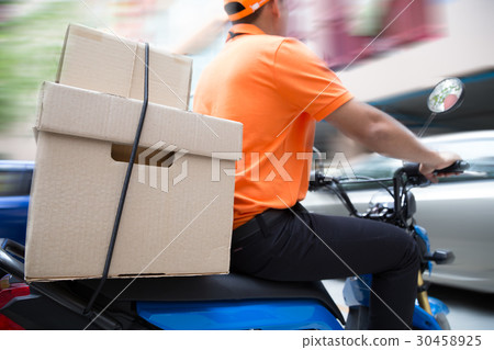 Delivery man ride motorcycle service 30458925