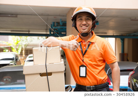 Box on motorcycle with delivery man 30458926