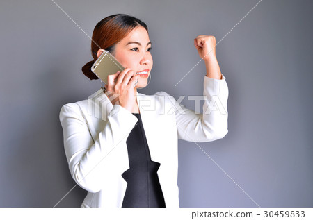Asian Business woman holding a mobile phone 30459833
