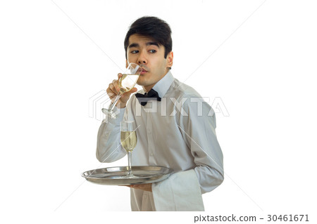 a young waiter in a white shirt with a butterfly a young waiter in a white shirt with a butterfly 30461671
