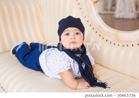 Adorable baby boy in the room. Newborn child Adorable baby boy in the room. Newborn child 30463736