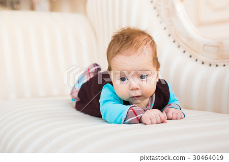 Close-up portrait of baby boy with red hair and Close-up portrait of baby boy with red hair and 30464019
