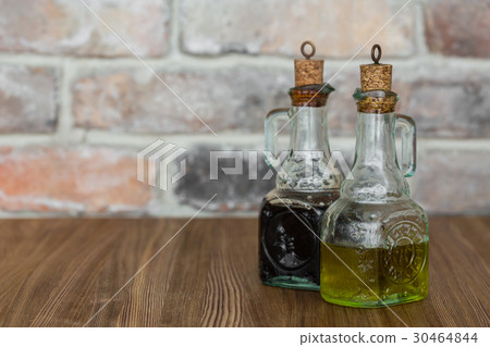 Oil and balsamic vinegar glass bottles with spouts Oil and balsamic vinegar glass bottles with spouts 30464844