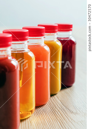 juice in the bottles 30472570