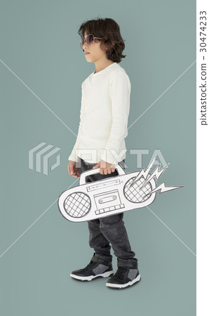 Caucasian Little Boy Holding Fake Jukebox Caucasian Little Boy Holding Fake Jukebox 30474233