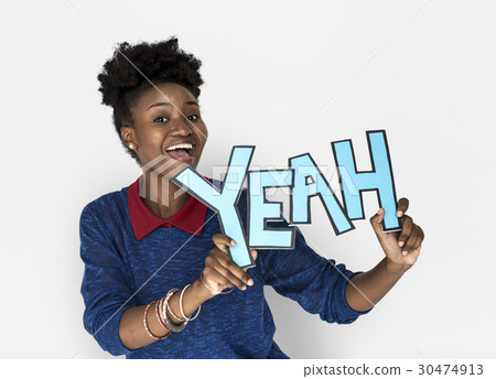 Smiling African Woman Holding Yeah Word Smiling African Woman Holding Yeah Word 30474913