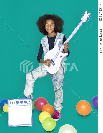 Portrait of a Little African Descent Girl with a Guitar Isolated Portrait of a Little African Descent Girl with a Guitar Isolated 30475009