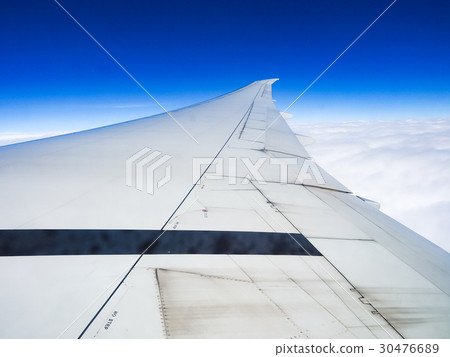 Looking out from the window of the plane Looking out from the window of the plane 30476689