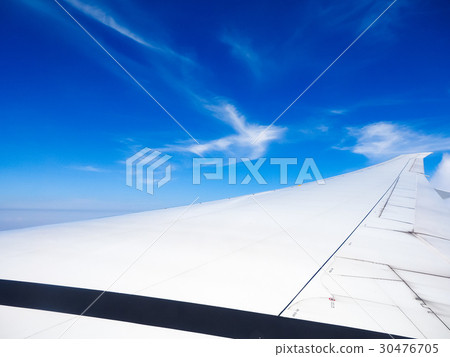 Looking out from the window of the plane 30476705