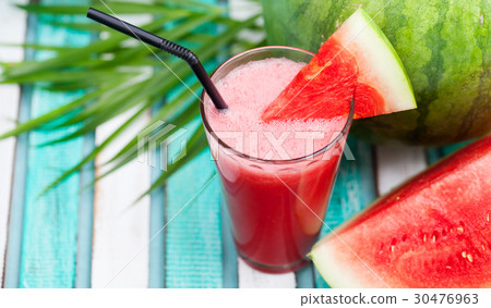Watermelon smoothie, fresh juice with palm leaves. 30476963