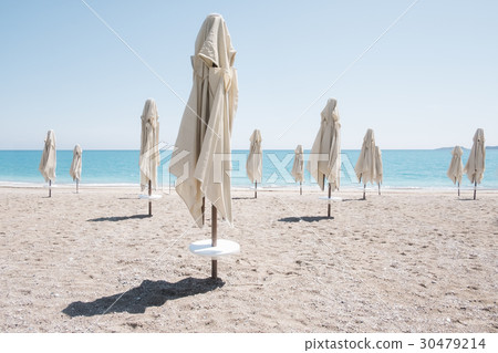 Sunshade umbrella on sea beach 30479214