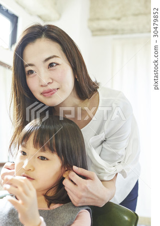 A child in a hairdresser A child in a hairdresser 30479852