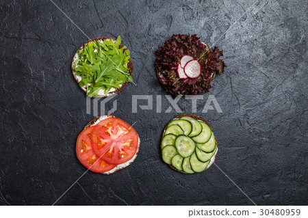Vegetarian sandwiches with cream cheese and 30480959